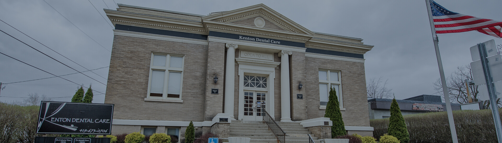 Wide-angle exterior view of the entrance to Kenton Dental Care